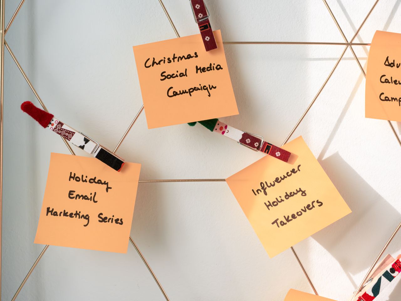 services-01 Sticky notes with holiday marketing ideas for Christmas social media and email campaigns.